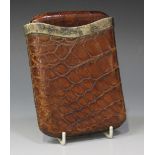 A Victorian silver mounted crocodile skin cigar case and cover, of rectangular form, Birmingham 1886