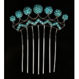 A Continental .800 silver and turquoise ornamental hair comb, the top of stylized crown form, pavé
