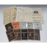 An interesting collection of Third Reich paperwork, including passbooks, identity documents and a