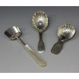 A George III silver caddy spoon with shell shaped bowl, the canted corner rectangular handle with
