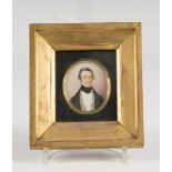 British School - Oval Miniature Portrait of a Gentleman wearing a Check Waistcoat and Black