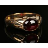 A 9ct gold and carbuncle garnet solitaire ring, ring size approx Y, cased. Buyer’s Premium 29.4% (
