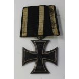 An Imperial German First World War period Iron Cross, second class, mounted as worn. Buyer’s Premium