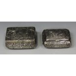 An early 20th century Dutch silver rectangular snuffbox, the hinged lid and curved sides embossed