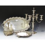 A Victorian plated on copper five light four scroll branch candelabrum, a plated two handled oval