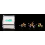 Two unmounted rectangular step cut emeralds and three pairs of gem set single stone earstuds with