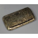 A 19th century French silver gilt snuffbox of curved rectangular form, engraved with flowers and