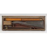 A 64 bore pump-up breech loading air cane by Reilly with sighted barrel, length 53.5cm, painted to