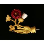 A gilt metal, moulded glass and stained ivory brooch, first half of the 19th century,