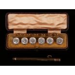 A 9ct gold cased drop action pencil by S Mordan & Co, London 1920, and a set of six gilt metal