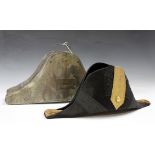 A Victorian officer's bicorn hat by Hawkes & Co, contained within its tin with applied shield shaped