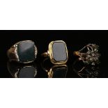 A 9ct gold and bloodstone signet ring (the shank cracked), a Swedish gold and black onyx signet ring