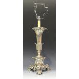 An Elkington & Co plated table lamp base, with flared foliate column on a triform acanthus leaf