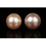 A pair of cultured pearl earrings, each mounted with a large single cultured pearl, with post and