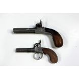 A double-barrelled 74 bore percussion boxlock pocket pistol with turn-off barrels, length 7cm,