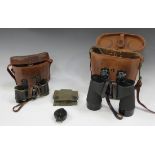 A pair of M16 7x50 prismatic binoculars, individual eyepiece focusing, with strap, contained