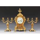 An early 20th century French ormolu mounted vernis Martin clock garniture, the clock with eight