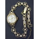 A Rotary 9ct gold lady's bracelet wristwatch, the signed circular silvered dial with gilt Arabic and