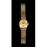 An Omega 9ct gold circular cased lady's wristwatch, the signed movement numbered '18774576', the