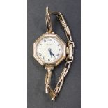 A 9ct gold octagonal cased lady's bracelet wristwatch, with an unsigned jewelled lever movement,