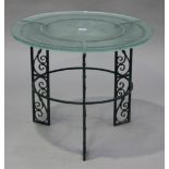 A French Art Deco glass-topped occasional table, the circular top frosted and etched with a stag,