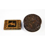 A 19th century Continental boxwood circular box and cover, carved with a floral medallion and