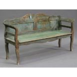 A 19th century Continental green painted pine bench, the shaped panel back and scroll arms above a