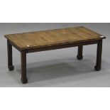 A 19th century and later rosewood coffee table with crossbanded decoration, raised on block legs,