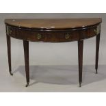 A late George III mahogany fold-over tea table, the hinged demi-lune top above a single drawer, on