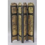 An early 20th century Chinese hardwood four-fold dressing screen, carved with figures within