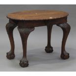 An early 20th century oak oval occasional table, the top raised on carved acanthus leaf cabriole