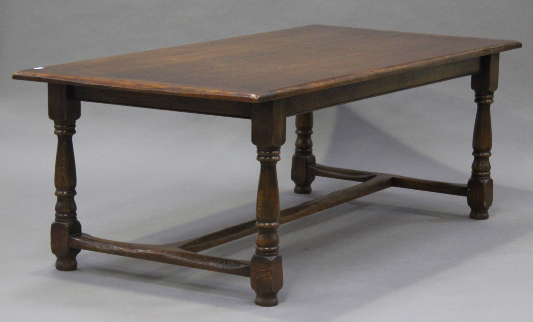 A late 20th century oak refectory table on turned and block legs, height 77cm, length 121cm, depth