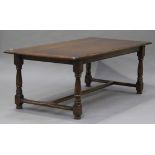 A late 20th century oak refectory table on turned and block legs, height 77cm, length 121cm, depth