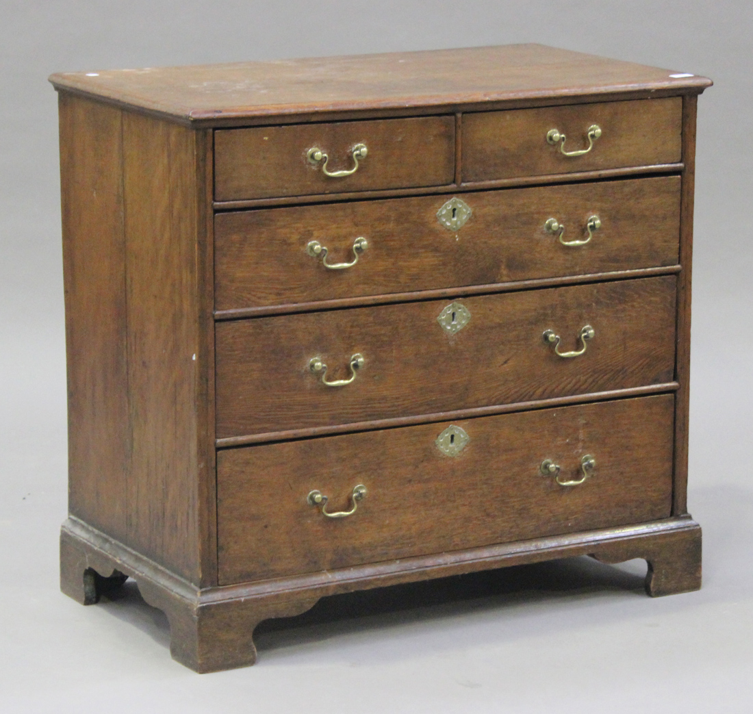 A 19th century oak chest of two short and three long drawers, on bracket feet, height 91cm, width