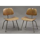 A pair of mid-20th century bent plywood chairs, designed by Charles Eames for Herman Miller,