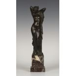 A late 19th century Continental dark brown patinated cast bronze full-length figure of a female nude