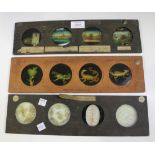 A set of four 19th century hand-painted magic lantern slides, mounted as one, depicting scenes of '