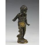 After Moreau - a 19th century French brown and gilt patinated cast bronze figure of a young boy