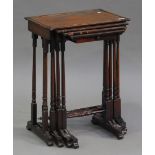 A Regency rosewood quartetto nest of occasional tables, the second table inlaid with a chessboard,