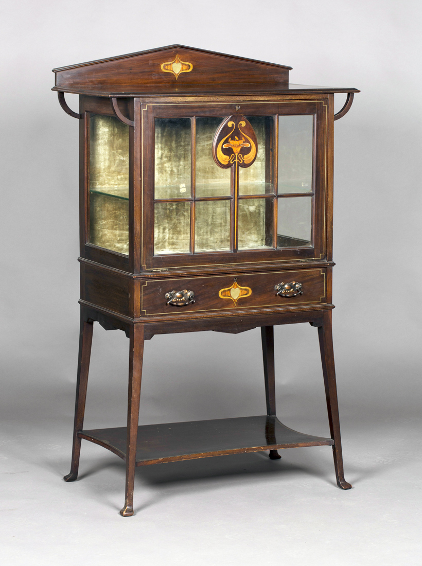 An Edwardian Arts and Crafts Glasgow School mahogany display cabinet, in the manner of E.A.