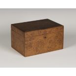 A late 19th century Arts and Crafts poker work box, the hinged lid decorated with an hour glass, the