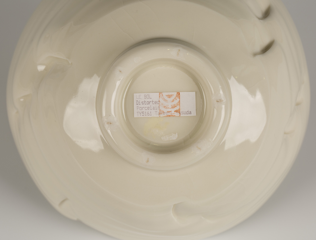 A Takeshi Yasuda 'Le Bol' porcelain bowl of distorted form, covered in a crackled cream glaze, - Image 2 of 2