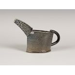 A Walter Keeler studio pottery salt glazed stoneware jug of oval outline with elongated spout,