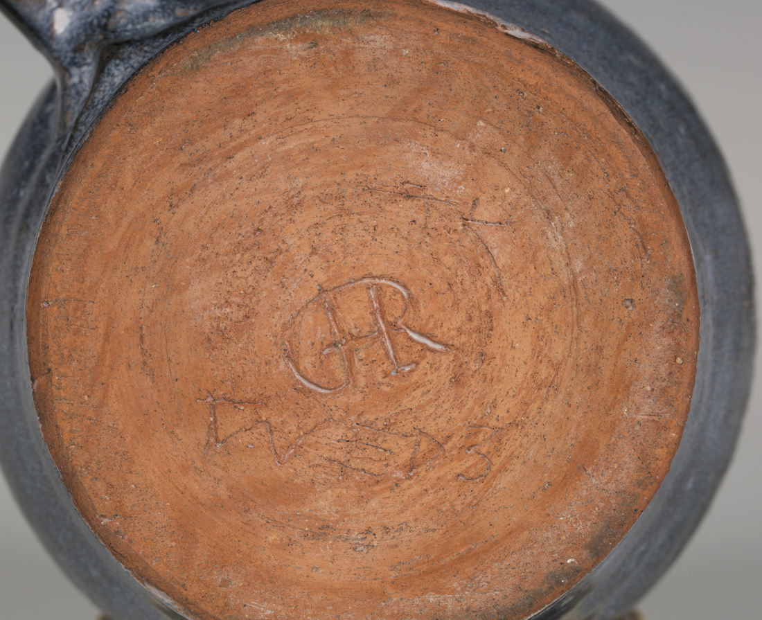 A Robert G. Heal studio pottery jug, covered in a speckled blue glaze with black glazed loop handle, - Image 2 of 2