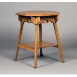 An early 20th century Arts and Crafts pale oak octagonal centre table, probably retailed by