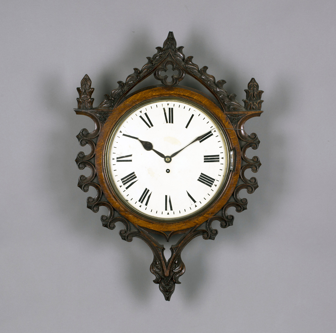 A 19th century Gothic Revival oak cased wall timepiece with brass single fusee movement, the