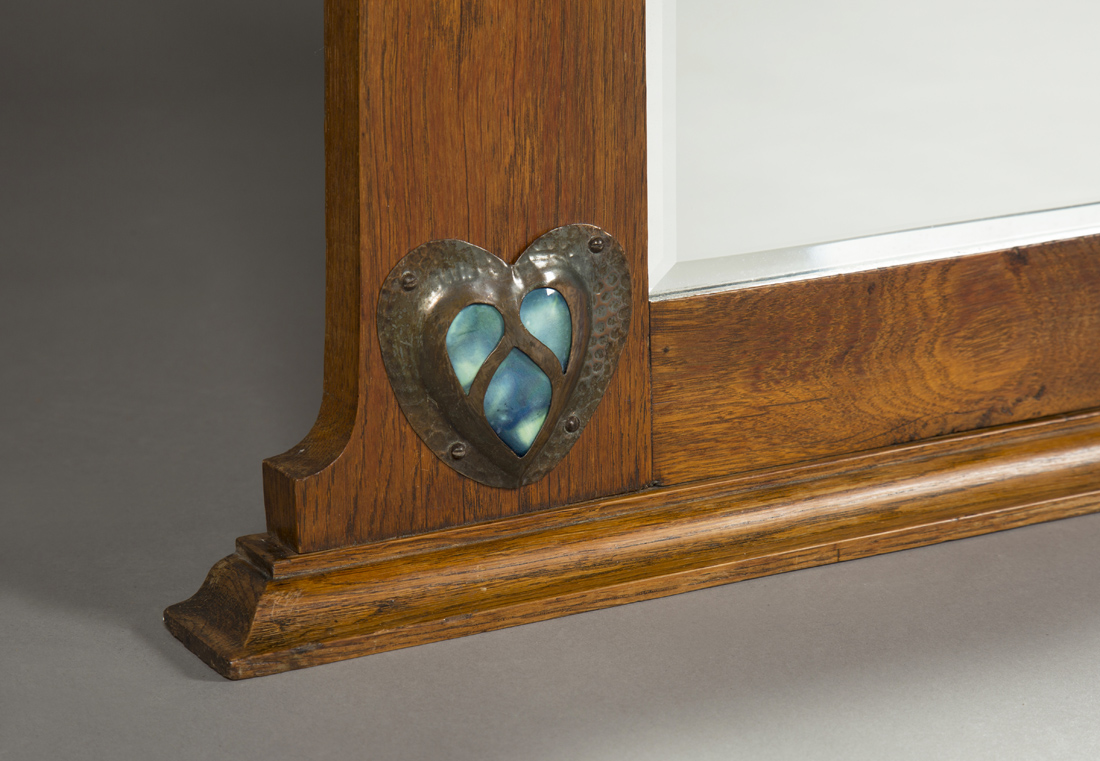 An Edwardian Arts and Crafts oak overmantel mirror, possibly retailed by Liberty & Co, the - Image 3 of 4