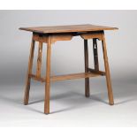 An Edwardian Arts and Crafts oak rectangular occasional table by Matthews of Gloucester, the moulded