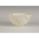 A Takeshi Yasuda 'Le Bol' porcelain bowl of distorted form, covered in a crackled cream glaze,