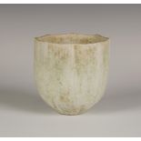 A John Ward studio pottery stoneware vessel of octagonal outline tapering to a cylindrical base,
